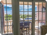Sliding French Doors that open up to your private balcony. Nice ocean views